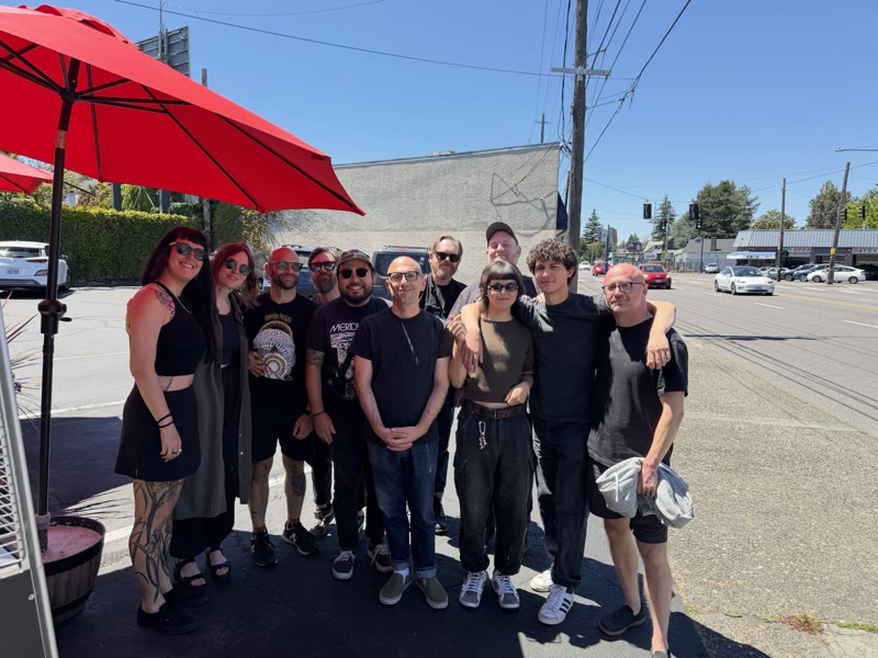 Have A Nice Life and touring friends gathered outside a restaurant